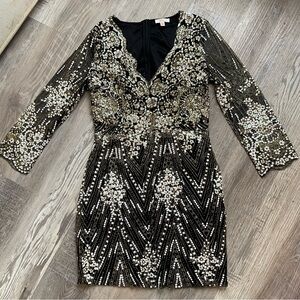 Glam Luxxel Black and Gold Sequin Long Sleeve Dress